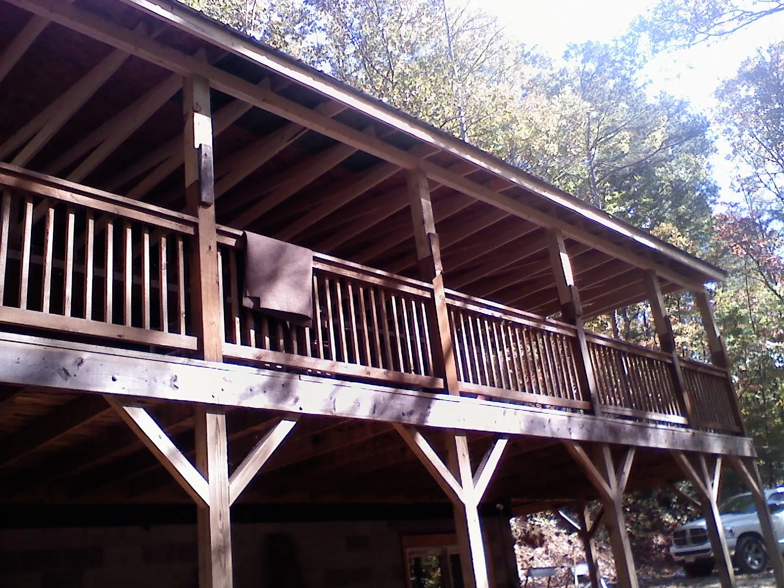 Timber framing under a new elevated porch and deck — Roof Leak Repair in Turners Falls by Roofing Brothers
